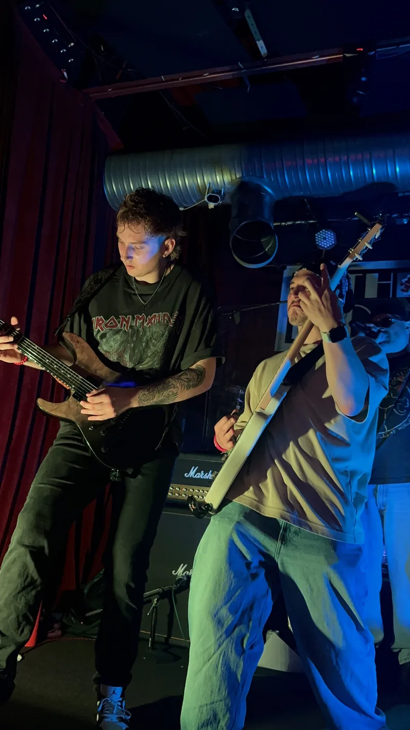 Neon Belly's two guitarists on stage at The Pond